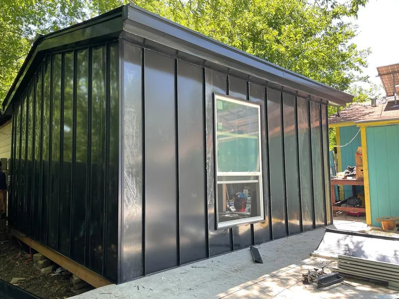 Black standing seam metal wall panels for Metal Roof Installation in Ashburn