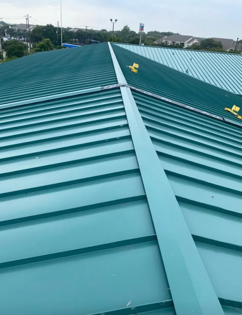 Green commercial metal roof ridge and valley for Metal Roof Repair in Ashburn