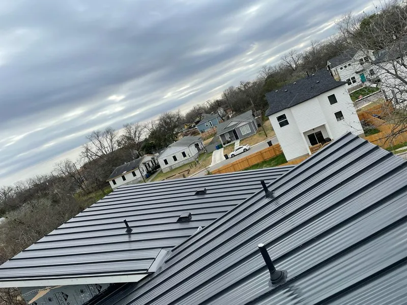Standing seam metal roof panels with vents for Skylight Repair in Ashburn